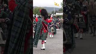 Drum Majors lead morning parade to the 2022 Braemar Gathering Highland Games in Scotland shorts [upl. by Ekeiram]