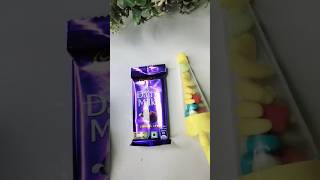 Dairy Milk Gems Cake 🎂 candyopeningvideo kidsfun candyshorts candy ytshortsvideo shorts [upl. by Thaddaus753]