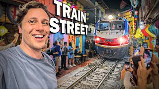 Trying the famous TRAIN STREET in Vietnam [upl. by Nnyllatsyrc997]