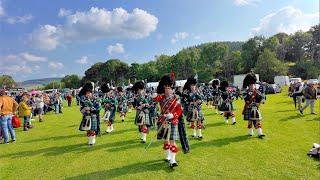 Drum Major Esson leads Ballater Pipe Band playing on the march during 2024 Lonach Highland Games [upl. by Eilahtan616]