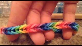 How to make a fishtail rainbow loom bracelet [upl. by Oicneconi]