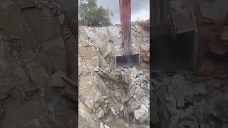 Excavator crushing shale rock process [upl. by Anawd]