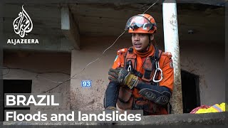 Bolsonaro surveys damage as Brazil mudslides death toll climbs [upl. by Anuahs]