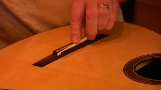 Stringing up a guitar part 5 putting on the strings [upl. by Jesselyn]