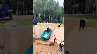 Three wheeled transport vehicle climbing cement slope test process [upl. by Ellicec273]