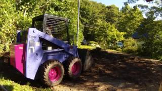 Bobcat 725 skidsteer driveway leveling time lapse [upl. by Arahas]