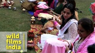 Ladies pass their thalis around in circle  Karva Chauth rituals [upl. by Yrem609]