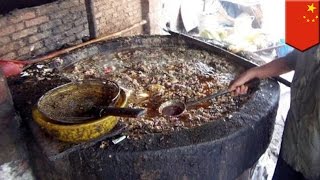 China gutter oil Disgusting recycled oil and sewage is used to cook Chinese street food  TomoNews [upl. by Aidas]