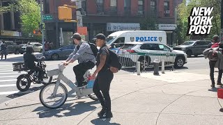 NYC professor who threatened to ‘chop’ Post reporter with machete is spotted at NYPD protest [upl. by Seni497]