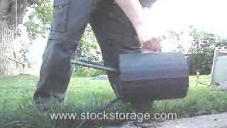 Grover Rocket Stove Dumping Ashes [upl. by Ryan285]