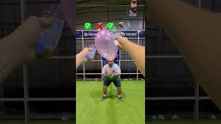 Holding balloons challenge football ballonpop soccer ballooon bigballon goalkeeper ballon [upl. by Ronoc719]