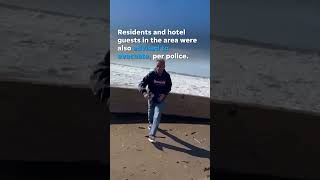 Watch Rogue wave jumps seawall and injures eight Shorts [upl. by Aleras752]