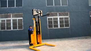 Heavy Duty Semi Electric Stacker with full free lift adjustable legs adjustable forks [upl. by Nad]