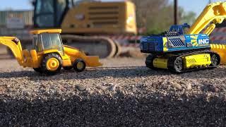 Construction toys  Hot wheels Matchbox and NORSCOT CAT 966G Wheel Loader at construction site￼ [upl. by Publias584]