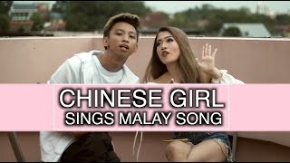 CHINESE GIRL SINGS MALAY SONG [upl. by Atsylac]