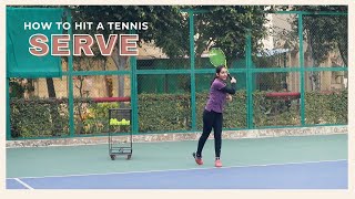 Tennis for Beginners How to hit a serve [upl. by Ahsac]