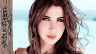 Nancy Ajram  A3mel 3a2la  EN Lyrics [upl. by Bain]