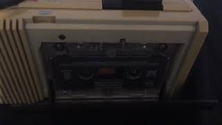 Inserting cassette into audiosonic cassette player [upl. by Collayer]