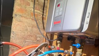 How to Descale a Rinnai Tankless Water Heater and Clean Flame Rods [upl. by Baillie]