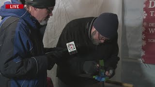 Making a tin star at the Christkindlmarket in Des Moines [upl. by Nilyram]