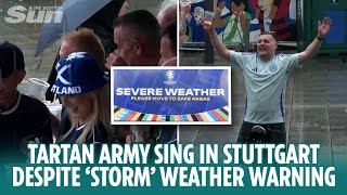 Tartan Army sing in the street not bothered by Stuttgart storm weather warning [upl. by Cordova]