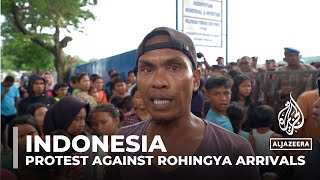 Rohingya refugees in Indonesia Locals protest against Rohingya arrivals [upl. by Ellerihs]