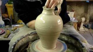 Making Throwing a Pottery Greek Roman Amphora Vase on the wheel [upl. by Kliman]