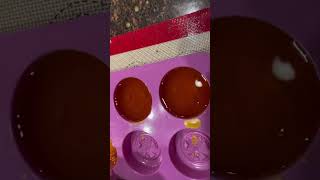 Melting down wax cappings into molds [upl. by Yeta]