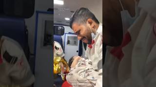 Gaza emergency worker breaks down in tears while cradling baby shorts [upl. by Kellen]