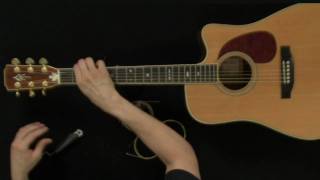 How To Change Acoustic Guitar Strings  Guitar Lessons [upl. by Meneau]