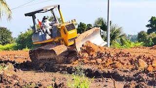 A bulldozer works hard to Widen the road for concrete pouring [upl. by Poucher]