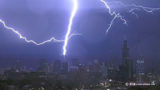 Lightning strikes Chicago skyscrapers during tornadowarned storm [upl. by Aled473]