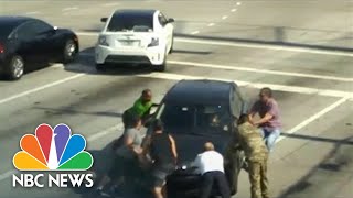 Watch Good Samaritans Rescue Florida Woman Who Passed Out While Driving [upl. by Ahtenak]