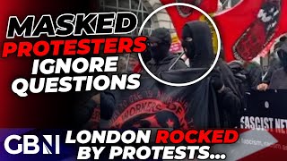 WATCH MASKED AntiRacism Protesters in BALACLAVAS Shun Questions as Arrests Rock London Rallies [upl. by Laise638]