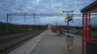 Sweden Stockholm Rotebro Train Station Arlanda Express passing by [upl. by Dnalra]