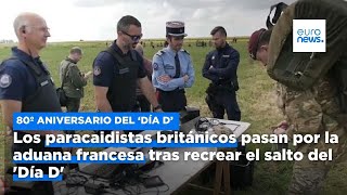 Los paracaidistas británicos pasan por la aduana francesa tras recrear el salto del Día D [upl. by Anuqahs]