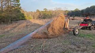 Unrolling Hay with a golf cart [upl. by Neicul]