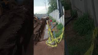 300 mm di pipe laying barish aagi🤦😂🤦😂 explorepage excavator trenching viralvideo pipelinework [upl. by Hutson]