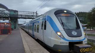 SL Pendeltåg X60 arriving at Tumba for Södertälje Centrum 150823 [upl. by Garnet]