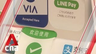 Japan adopts new approaches to promote cashless payments [upl. by Olyhs]