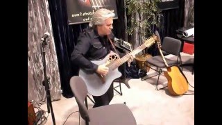 Doyle Dykes playing a Beatles compilation  Shubb capo booth  NAMM 2016 Godin Fender Gibson Taylor [upl. by Harbot]