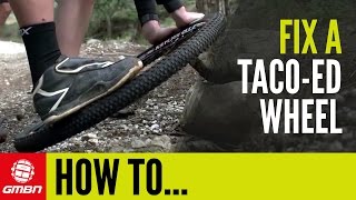 How To Fix A Buckled Wheel – Straighten A TacoedPringled Wheel  Trailside Maintenance [upl. by Ashman991]