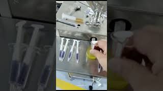 Semi automatic teeth gel syringe filling machine glycerin syringe filling machine [upl. by Atinauq730]