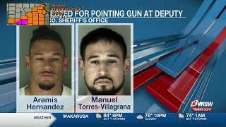 Two Topeka men facing weapons crimes after pointing firearm at officer in Shawnee County [upl. by Xever995]