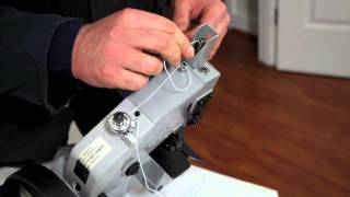 How to thread a Newlong NP7A bag closing machine [upl. by Shinberg]