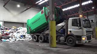 Emptying Gradeall Hook Lift Portable Waste Compactor [upl. by Berga]