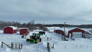 John Deere Tractor Pounding the SNOW Drifts [upl. by Boyer233]