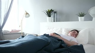 Young Man Sleeping in Bed  Stock Footage  Videohive [upl. by Nnek]