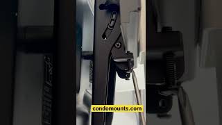 How to Remove safety screw to unlock tv from stuck position Condomounts tvmount wallmount [upl. by Yelad19]