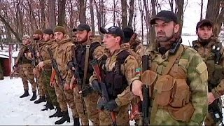 Ucraina ceceni combattono al fianco dei separatisti filorussi [upl. by Velick623]